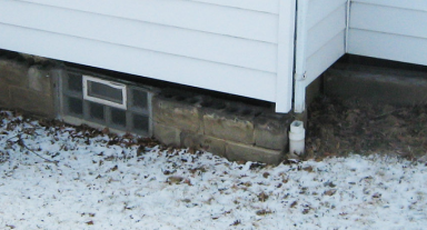 Photo of a home's damaged foundation'